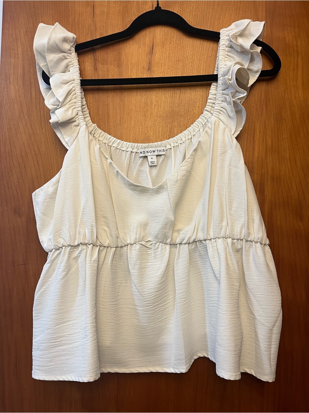 NoowThis Cream Ruffle Strap Peplum Tank